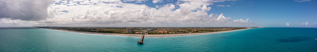 Aerial panorama Juno Beach Fishing Pier Florida coastline