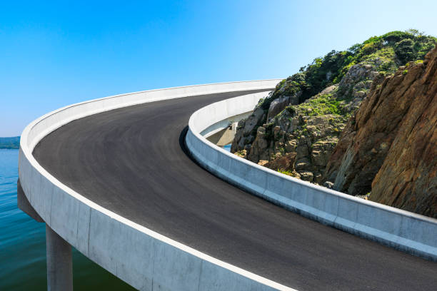 istock Asphalt highway and mountain with river landscape. 1310032434