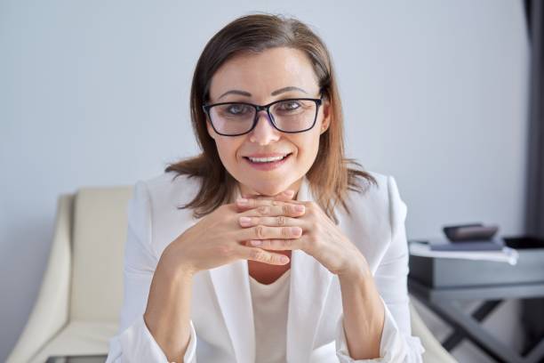 istock Female mentor, tutor, teacher looking at webcam, closeup face. 1310036527