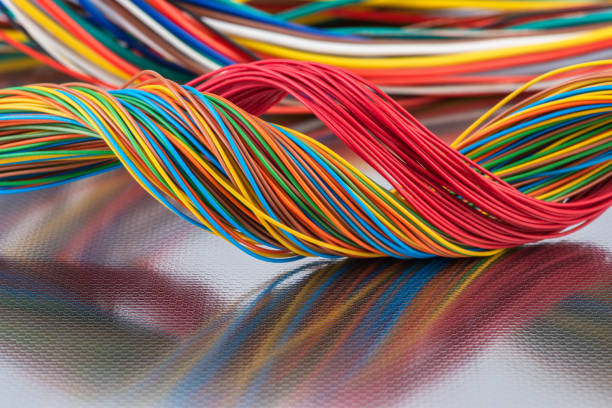istock Colorful electrical and telecommunication cable wire on shiny metal surface 1310037593