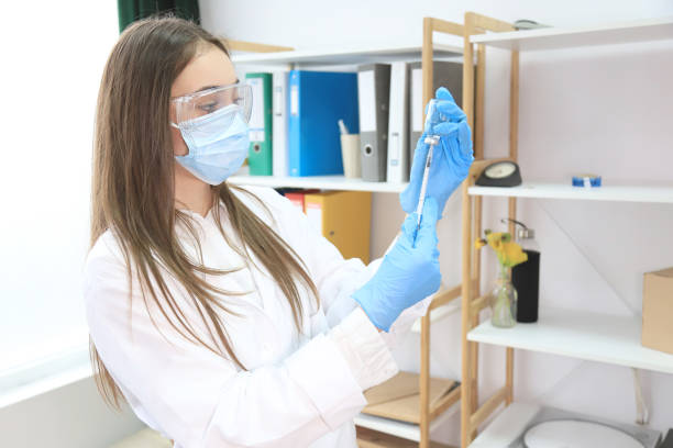istock Young doctor preparing a vaccine 1310039150