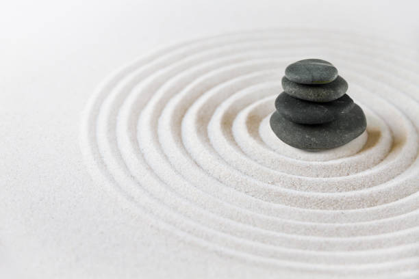 istock Zen japanese garden and black stones background 1310042106
