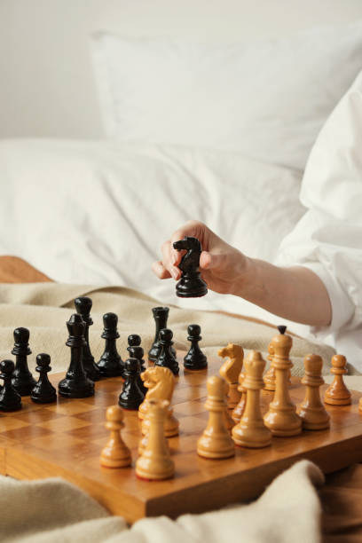 istock Chess Player Woman Hand. Black Horse Step Forward 1310045322