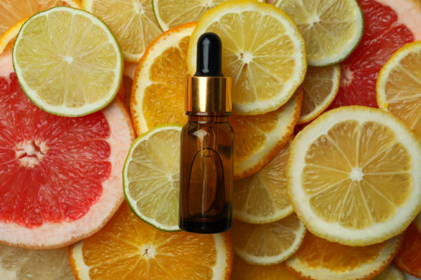 istock Dropper bottle with oil on different citrus slices 1310046240