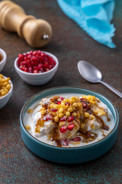 istock Super soft  Dahi Bhalla or Dahi Vada served in a black bowl 1310046253
