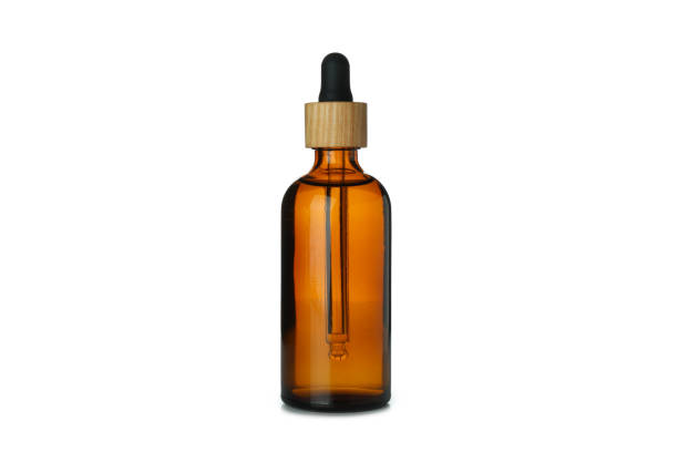 istock Dropper bottle with oil isolated on white background 1310046273
