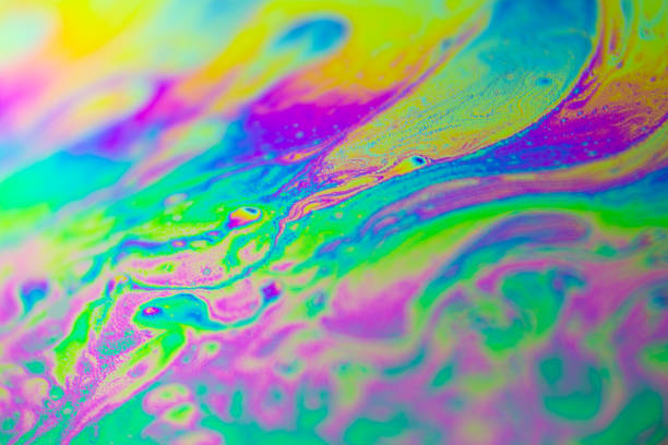 Close up macro colorful abstract soap bubble on black background