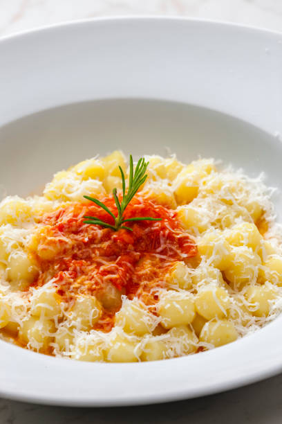 istock gnocchi with tomato sauce and parmesan cheese 1310046721