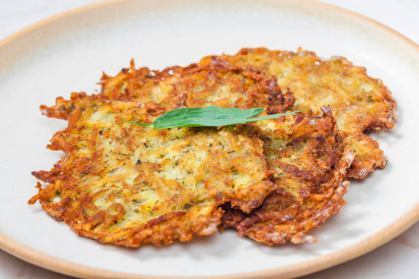 still life of potato pancakes still life of potato pancakes hash brown stock pictures, royalty-free photos & images