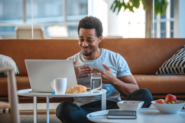 istock Grateful Mixed race Mid Adult Male Online Student 1310046952