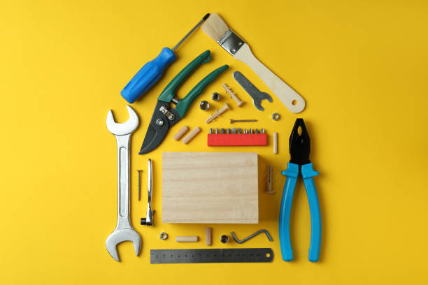 istock House made of working tools on yellow background 1310049890
