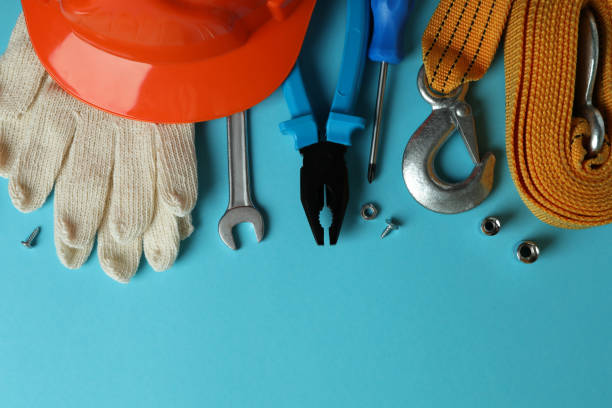 istock Concept of Labor Day with different tools on blue background 1310049936