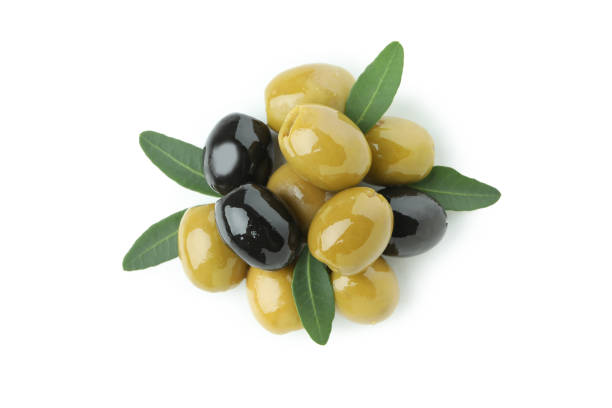 istock Olives with leaves isolated on white background 1310052722