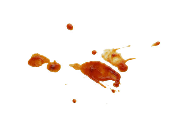 istock Barbecue sauce splashes isolated on white background 1310054979