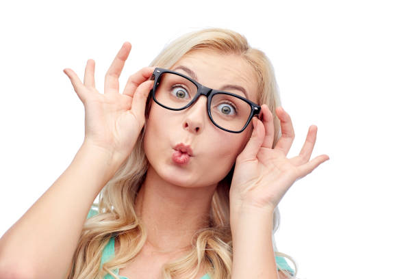 istock happy young woman in glasses making fish face 1310055774
