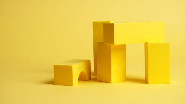 istock abstract squares on a yellow background with shadows, top view, geometric shapes for demonstration 1310059162