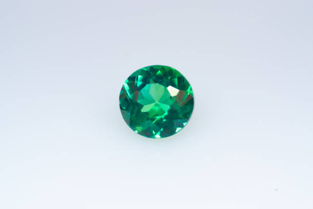 istock Natural gemstone green sapphire on white background 1310060717