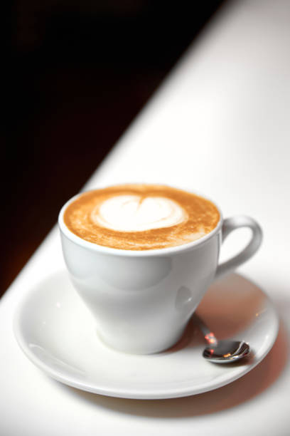 istock A cup of Latte coffee in a white cup. Close-up, selective focus. 1310062071