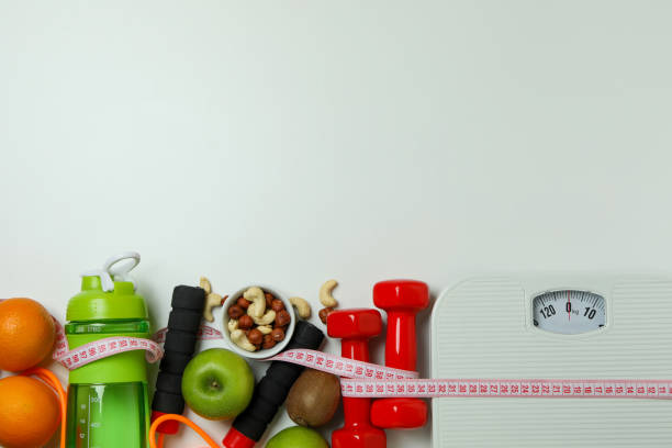istock Weight loss accessories on white background, space for text 1310064740