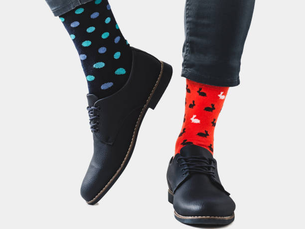 istock Men's legs, trendy shoes and bright socks 1310066361