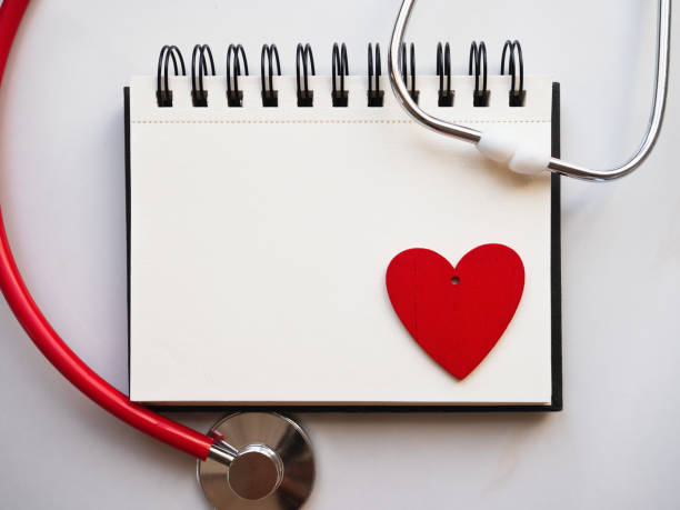 istock Notebook with a drawing in the shape of a heart 1310066484