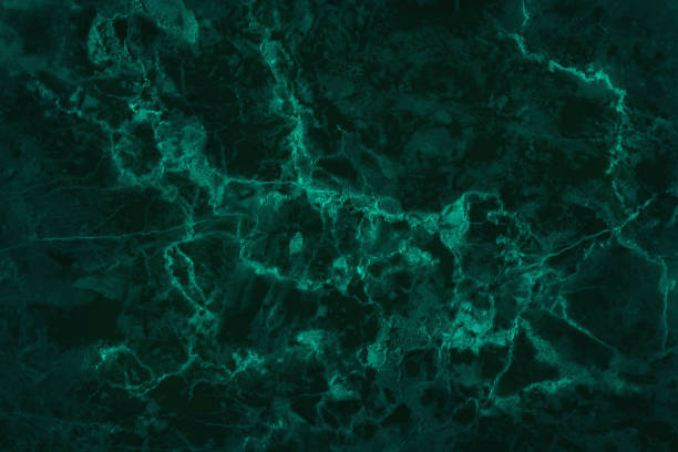 Dark green marble texture background with high resolution, top view of natural tiles stone in luxury and seamless glitter pattern. Dark green marble texture background with high resolution, top view of natural tiles stone in luxury and seamless glitter pattern. emerald green stock pictures, royalty-free photos & images