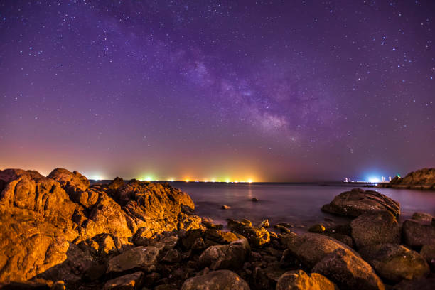 istock sea at night and beautiful Milky Way 1310066932