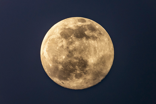 Super full moon with dark background. Horizontal Photography.
