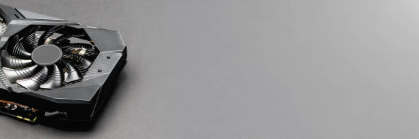 istock Graphic video card  on a gray background. GPU card. Mining cryptocurrency concept. Banner 1310072565