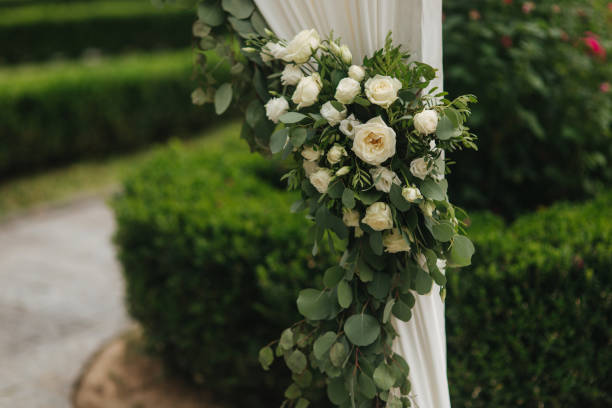 istock Flowers on wedding decor, green and white color 1310072653