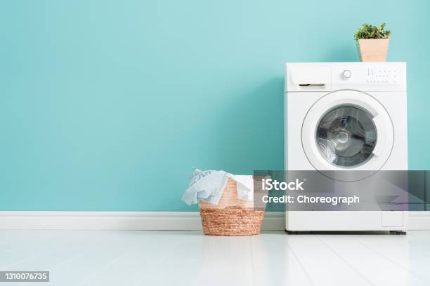 Laundry Room With A Washing Machine Stock Photo - Download Image Now - Washing Machine, Laundry, Dryer