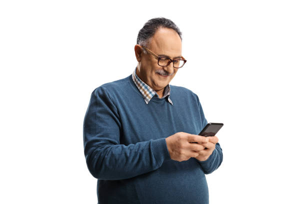istock Smiling mature man typing on a mobile phone 1310077290