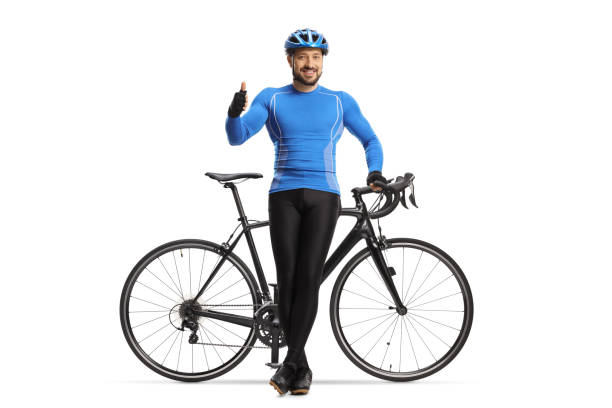 Male cyclist sitting on a bicycle and showing thumbs up isolated on white background