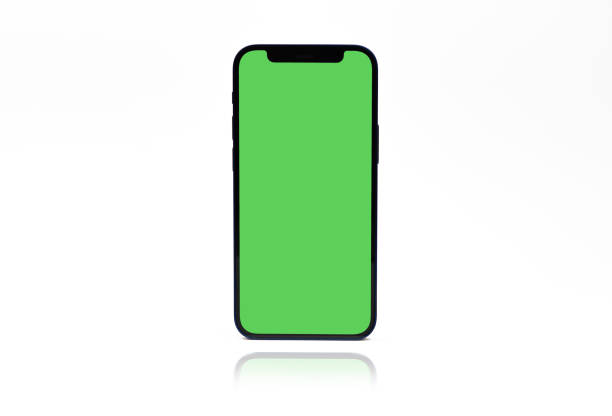 istock Smartphone mockup with blank green screen isolated on white background 1310079866