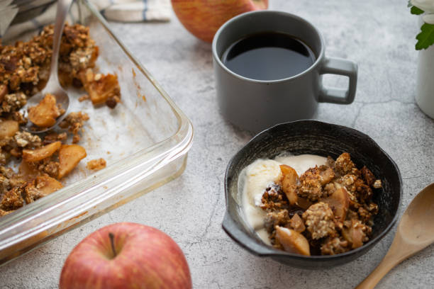 istock Home-made Apple crisp served in a bowl with vanilla iced cream 1310081670