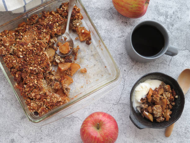 istock Home-made Apple crisp served in a bowl with vanilla iced cream 1310081709