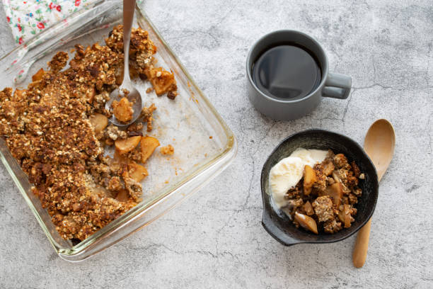 istock Home-made Apple crisp served in a bowl with vanilla iced cream 1310081723