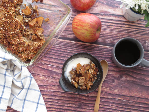 istock Home-made Apple crisp served in a bowl with vanilla iced cream 1310081760