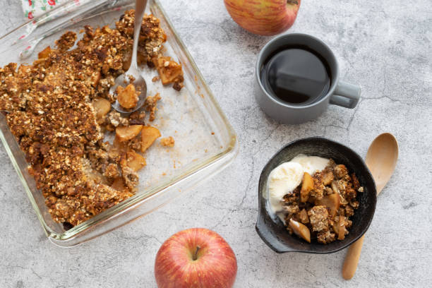 istock Home-made Apple crisp served in a bowl with vanilla iced cream 1310081876