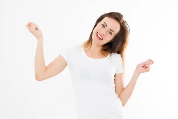 Photo of Happy woman in blank template white t shirt isolated. Success european girl. Copy space