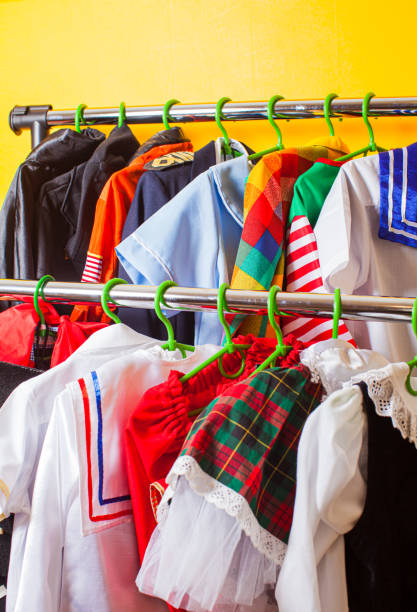 istock Clothes Hanging On Rack In Store 1310088478