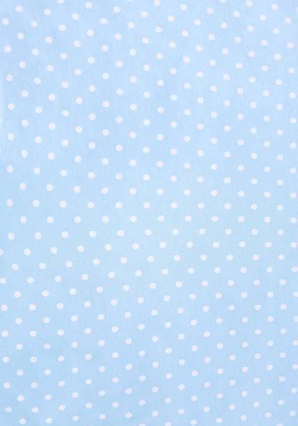 istock Polka dot blue fabric background and texture. Wallpaper, card, cover design and decor 1310090119
