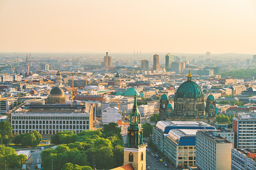 Panoramic view over the city of Berlin Mitte with the Museum Island on the right.\nBerlin is still one of the hottest travel destination in europe with almost 14. million visitors in 2019.