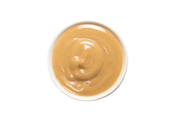 istock Mushroom sauce in a bowl isolated on white background. 1310091310