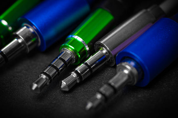istock speaker cables 3.5 jack. against a dark background 1310096928