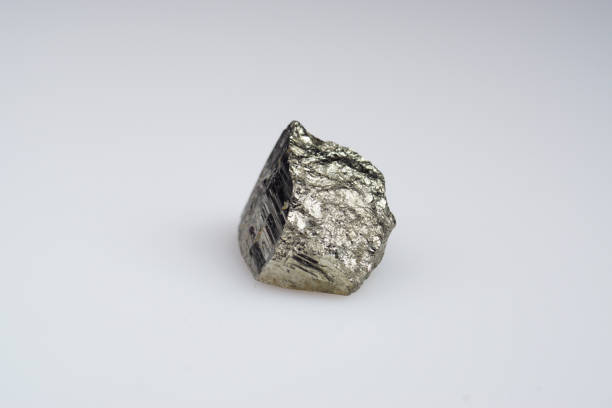 istock Natural gemstone pyrite on white background 1310098868