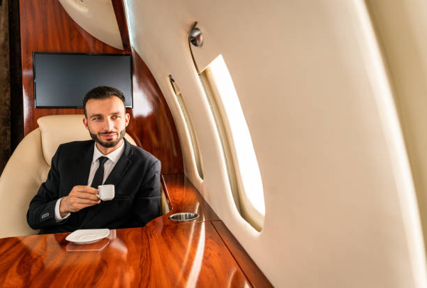 istock Businessman flying on private jet 1310102250