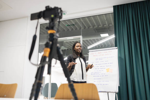 istock A young teacher is having an online lecture about social media. 1310103761