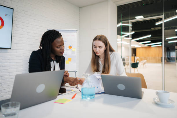 istock Smart and confident  business women work together 1310103850