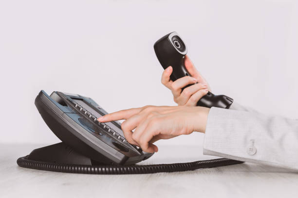 istock business. voip phone in the office close up 1310104498